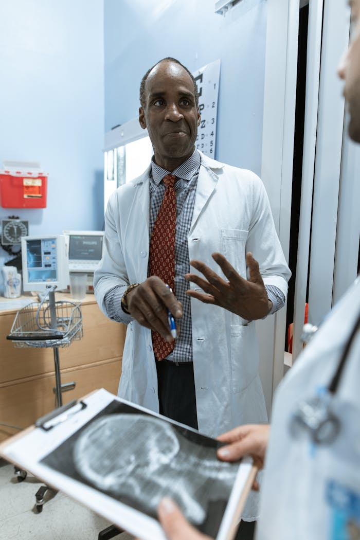 Doctors Talking and Collaborating with the Xray Result